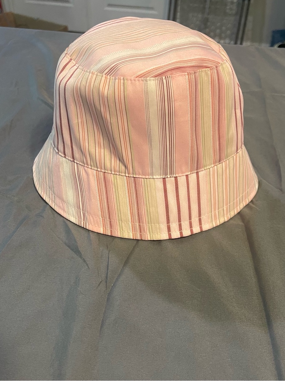 Striped Pink Bucket Hat with Pastel Accents